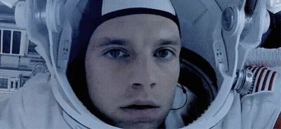Man In Space Suit Wearing Helmet GIF