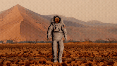 Man In Space Suit With US On Chest GIF