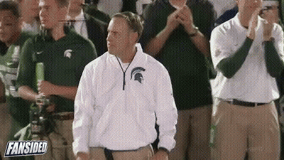 Man In Spartan Jacket Standing Before Crowd GIF