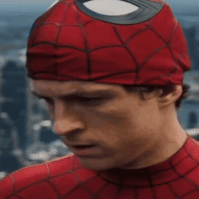 Man In Spider-Man Costume Covering Face GIF