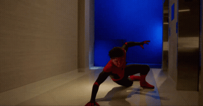 Man In Spider-Man Costume Crawling GIF