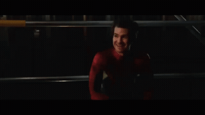 Man In Spider-Man Costume In Dark Room GIF