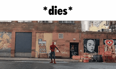 Man In Spider-Man Costume In Front Of Building GIF