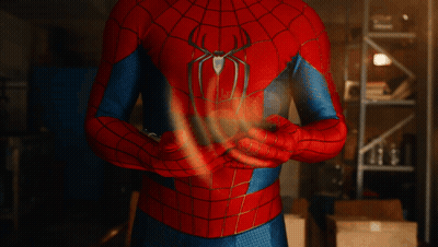 Man In Spiderman Costume Holding Something GIF