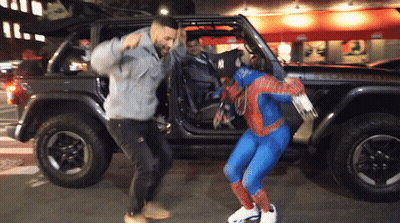 Man In Spiderman Costume Next To Jeep GIF