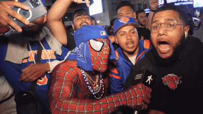 Man In Spiderman Costume Poses GIF
