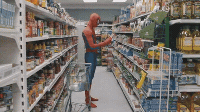 Man In Spiderman Costume Shopping In Supermarket GIF