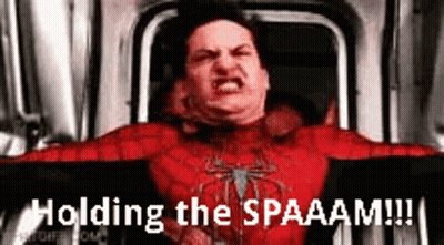 Man In Spiderman Suit Holding Sign Saying Holding The Spaaam GIF
