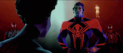 Man In Spiderman Suit Standing Beside Woman GIF