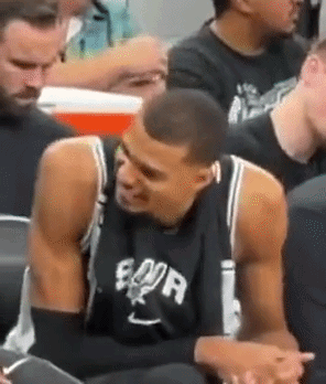Man In Spurs Jersey Sitting In Stadium GIF