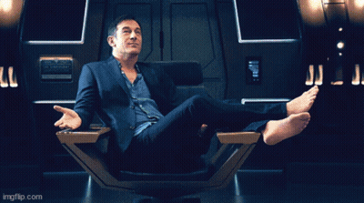 Man In Star Trek Uniform Holding Gun GIF