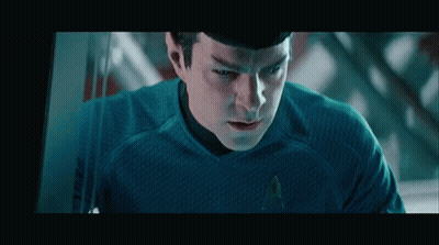 Man In Star Trek Uniform Looking GIF