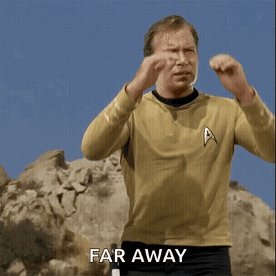 Man In Star Trek Uniform Making Far Away Gesture GIF