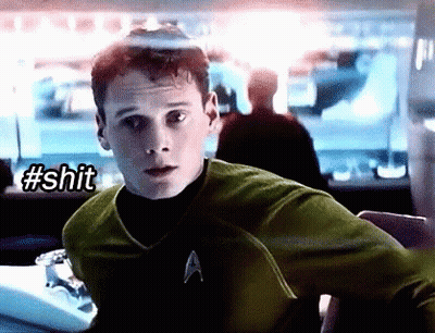 Man In Star Trek Uniform Sitting At Desk With #Shit GIF