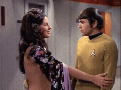 Man In Star Trek Uniform Standing With Woman GIF