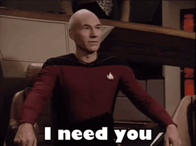 Man In Star Trek Uniform Waving GIF