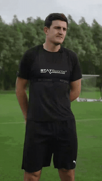 Man In Statsports Shirt On Field GIF