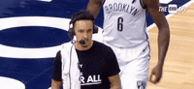 Man In Stop Me Lanyard Interviewed GIF