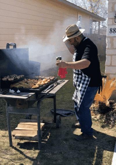 Man In Straw Hat Grilling Outdoors GIF