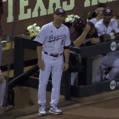 Man In Striped Aggies Jersey On Field GIF