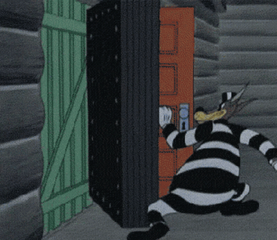 Man In Striped Jumpsuit Holding Key GIF