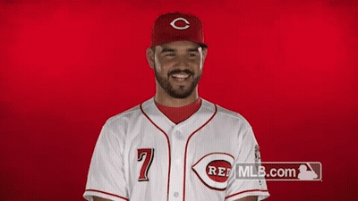 Man In Striped Pajamas With Mr Bean Sign GIF