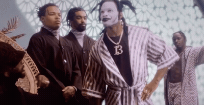 Man In Striped Robe With Letter B GIF