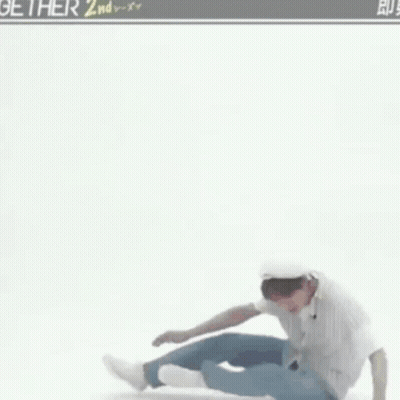 Man In Striped Shirt And Blue Jeans Dancing GIF