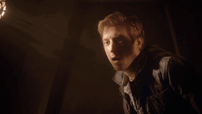 Man In Striped Shirt And Denim Jacket GIF