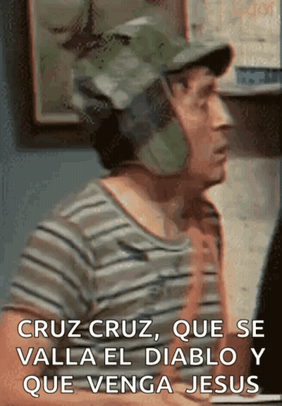 Man In Striped Shirt And Hat Says Cruz Cruz Que Se Valla El Diablo Y Que Venga Jesus GIF