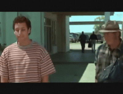 Man In Striped Shirt And Man In Hat GIF