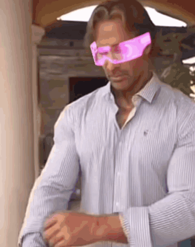 Man In Striped Shirt And Pink Glasses GIF
