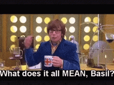 Man In Striped Shirt And Tie Says What Does That Even Mean GIF
