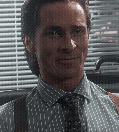 Man In Striped Shirt And Tie Smiling At Window GIF
