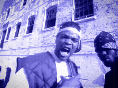 Man In Striped Shirt And Wu Tang Beanie GIF