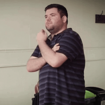 Man In Striped Shirt Arms Crossed GIF