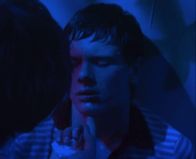 Man In Striped Shirt Covering Face GIF
