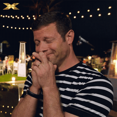 Man In Striped Shirt Covering Mouth GIF