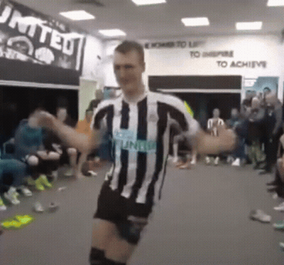 Man In Striped Shirt Dancing GIF