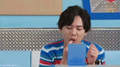 Man In Striped Shirt Eating From Blue Box GIF