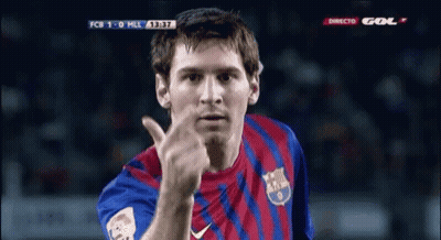 Man In Striped Shirt Giving Middle Finger At Soccer Game GIF