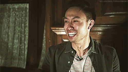 Man In Striped Shirt Green Jacket Smiling Delusionalforharmony GIF