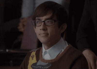 Man In Striped Shirt Hands Out GIF