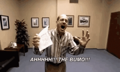 Man In Striped Shirt Holding Paper And Screaming GIF