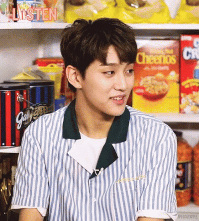 Man In Striped Shirt In Front Of Cheerios Shelf GIF