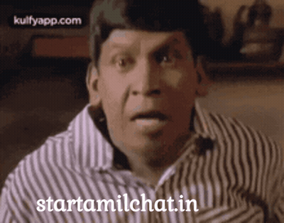 Man In Striped Shirt Making Funny Face GIF