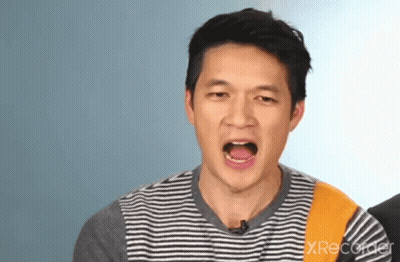 Man In Striped Shirt Making Funny Face GIF