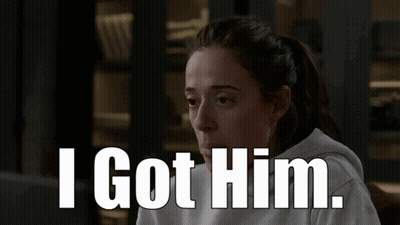 Man In Striped Shirt Making Funny Face GIF