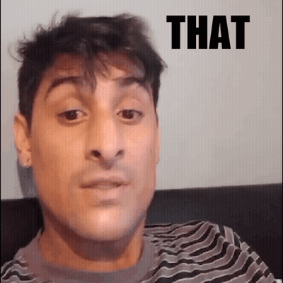Man In Striped Shirt Making Funny Face GIF