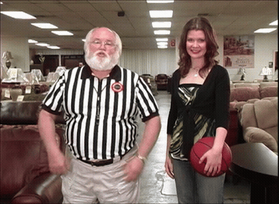 Man In Striped Shirt Next To Woman Holding Basketball GIF